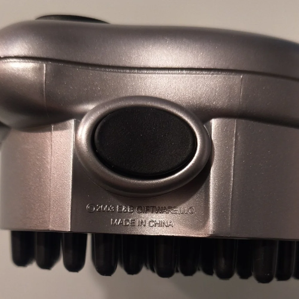 Paw Pet Massager. Quiet, safe and non threatening to pets.